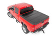Rough Country 47113551 Low Profile Hard Tri-Fold Tonneau Cover 07-13 1500 5.5 Foot Bed w/Rail Caps Rough Country - Truck Part Superstore