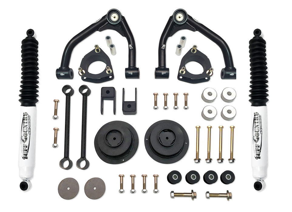 Tuff Country 14156KN 4 Inch Lift Kit 14-18 Chevy Suburban/Tahoe/Yukon XL/Yukon 1500 w/ SX8000 Shocks Fits Models w/aluminum factory Upper Control Arms or Two Piece Stamped Steel  Tuff Country - Truck Part Superstore