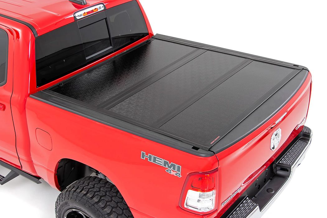Rough Country 47320550 Dodge Low Profile Hard Tri-Fold Tonneau Cover 19-20 RAM 1500 Quad/Mega Cab 5.5ft; Bed W/O RAMbox Rough Country - Truck Part Superstore