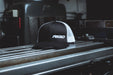 Rigid Industries 1029 RIGID Retro Trucker Hat With Offset Logo; Black Front; White Mesh Snapback - Truck Part Superstore