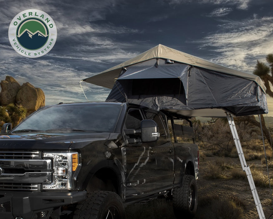 Overland Vehicle Systems 18049936 Roof Top Tent 4 Person Extended Roof Top Tent Dark Gray Base With Green Rain Fly With Bonus Pack Nomadic Overland Vehicle Systems - Truck Part Superstore