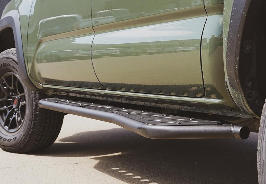 Cali Raised LED 39302150848554 05-21 Tacoma Step Edition Rock Sliders Kick Out Raw Filler Plate Powder Coat Double Cab Long Bed Cali Raised LED - Truck Part Superstore