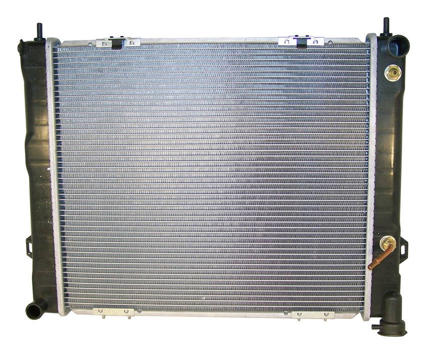 Crown Automotive Jeep Replacement 4734103 Radiator; 1.25 in. Inlet.; 1.5 in. Outlet; 22 1/8 x 19 3/8 Core; 2 Row; - Truck Part Superstore