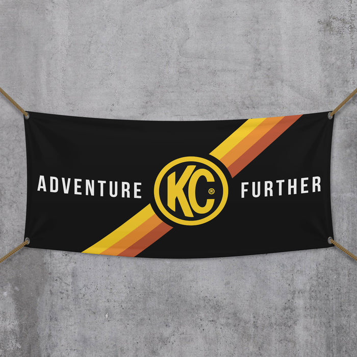 KC HiLiTES 99021 KC Banner 36x72 Adventure Further Logo Black Yellow - Truck Part Superstore