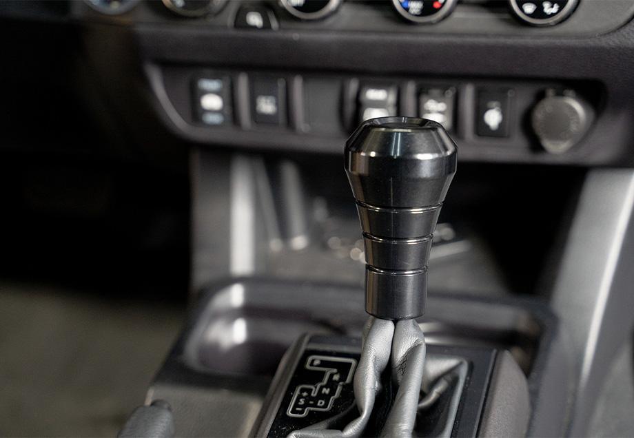 Cali Raised LED CR2416 Toyota Shift Knob 07-21 Tundra 05-Present Tacoma 03-Present 4Runner Anodized Aluminum Red Cali Raised LED - Truck Part Superstore