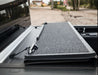 TrailFX TFX5705 Hard Tri Fold Non-Lockable Black Aluminum With Carpeted Under Panels - Truck Part Superstore