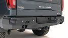 Fab Fours CS19-W4051-B Premium Rear Bumper; Uncoated/Paintable; w/Blind Spot Monitor Mount; - Truck Part Superstore