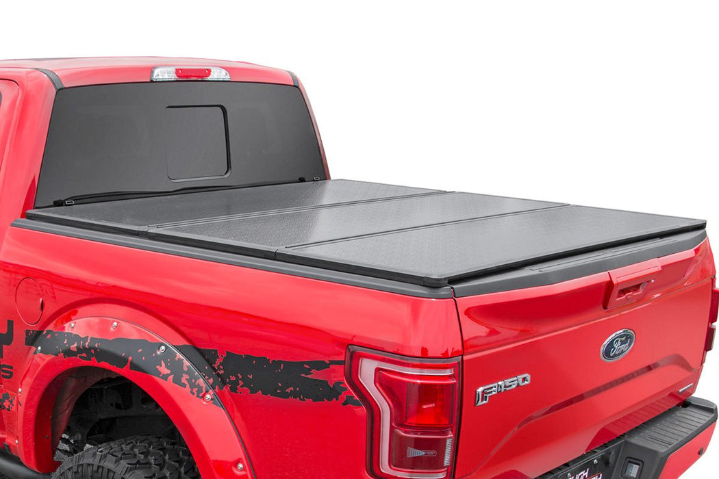 Rough Country 45515650A Hard Folding Bed Cover 6.5 Ft Bed 15-21 Ford F-150 2WD/4WD Rough Country - Truck Part Superstore